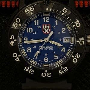 Lumi-nox Black and Blue Swiss Quartz Watch , women’s watch. Model #3000 / 3900.